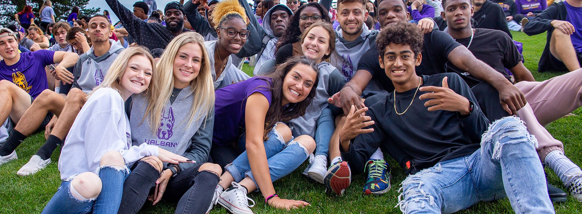 A group of students at a football game.