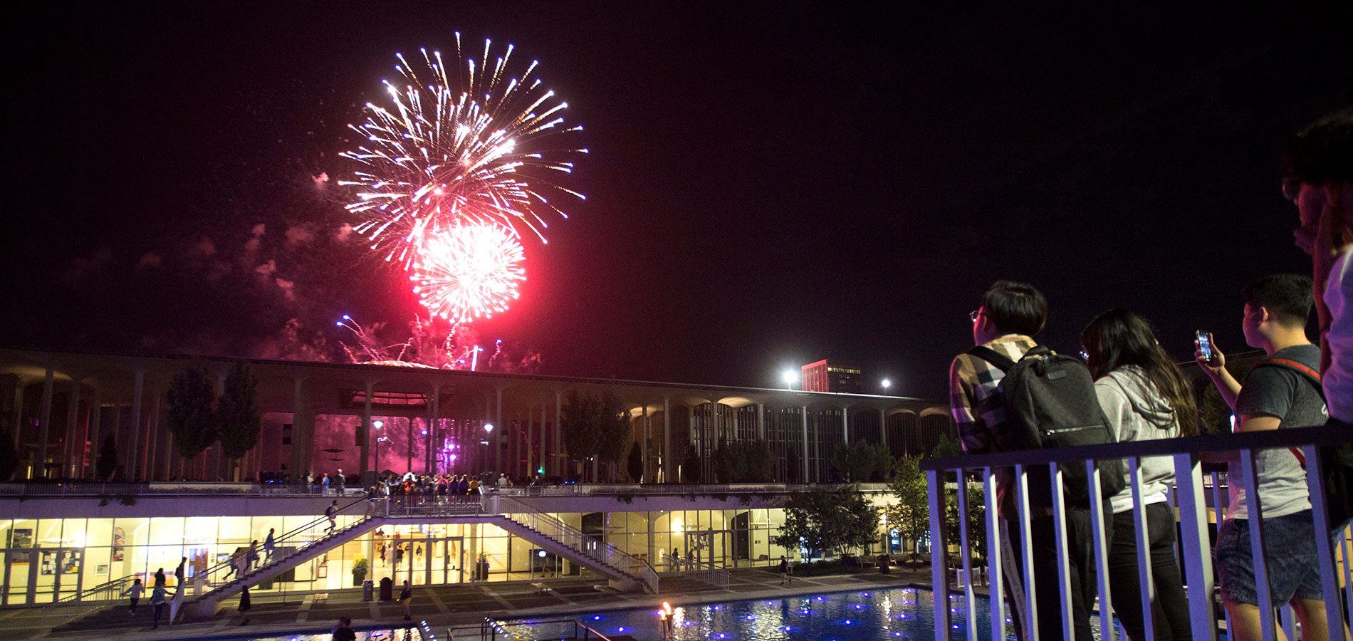 Students watching fireworks at convocation