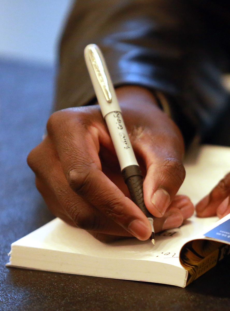 Nana Kwame Adjei-Brenyah, author of Friday Black, UAlbany Class of 2013, speaks during a New York State Writer's Institute at the University at Albany Performing Arts Center on Tuesday, October 30, 2018. (photo by Patrick Dodson)