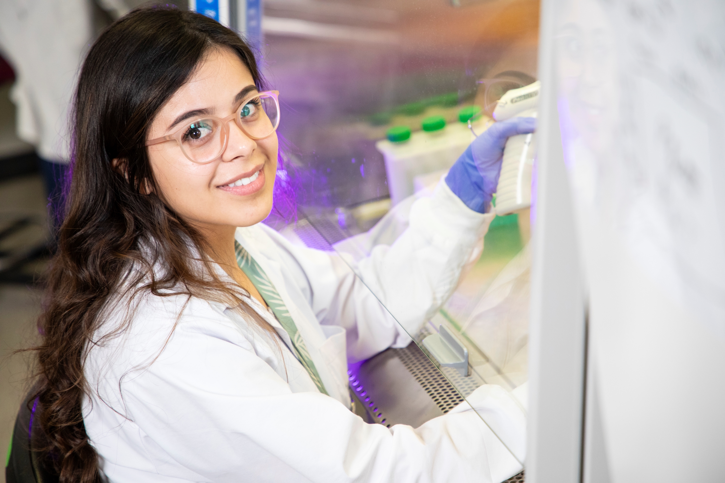 UAlbany doctoral student Maria Belen Paredes-Espinosa works in a lab at the College of Nanotechnology, Science, and Engineering. (Photo by Patrick Dodson)