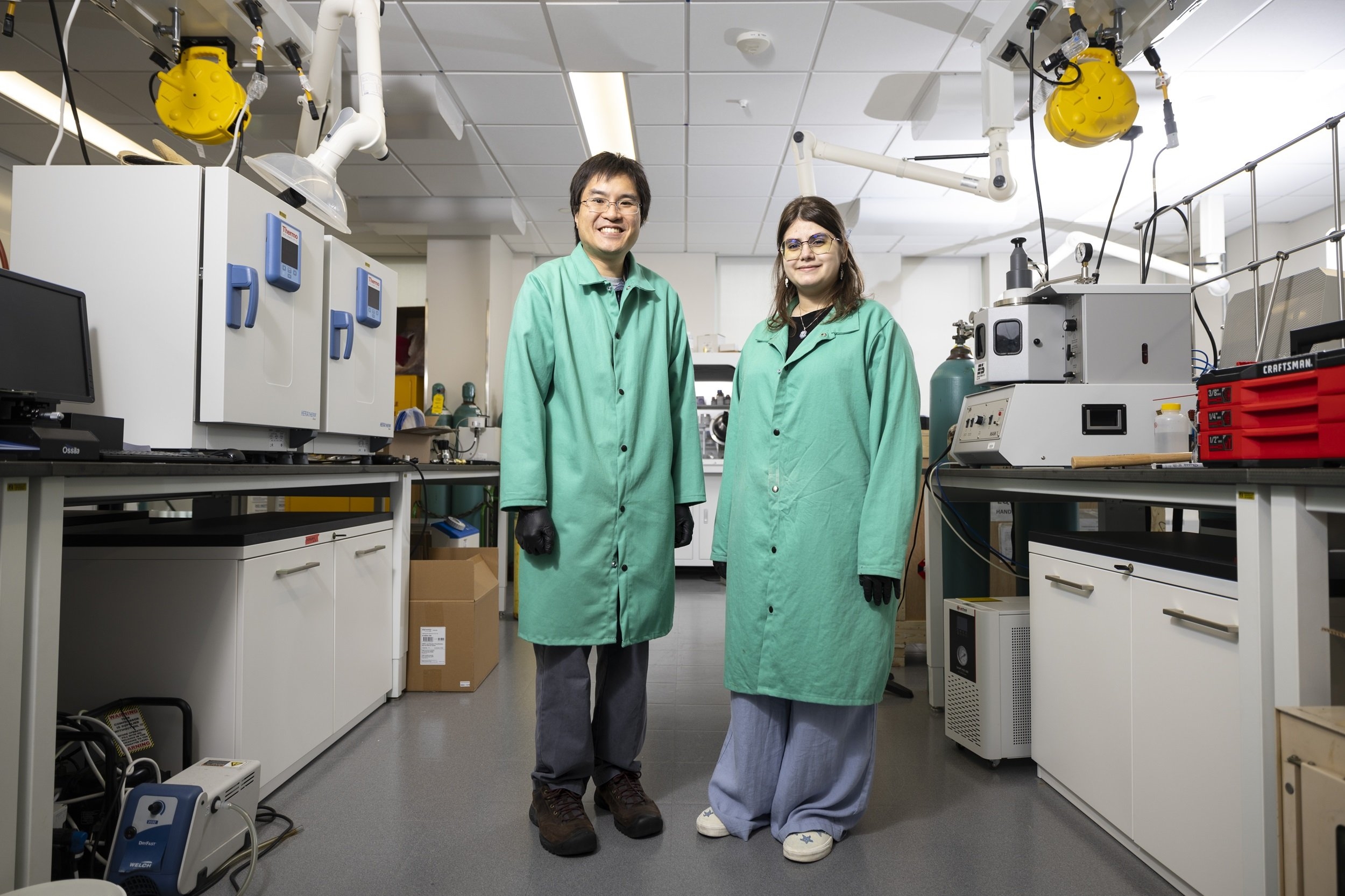 Chemistry student Alma Kolakji works alongside UAlbany Assistant Professor Michael Yeung on her summer research project. (Photo by Patrick Dodson)