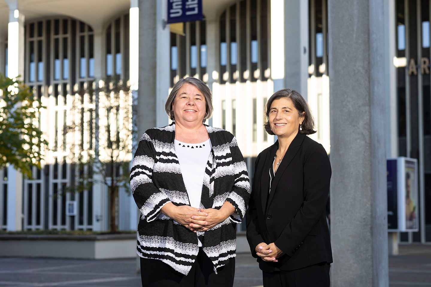 A portrait of Victoria Rizzo and Erin Bell