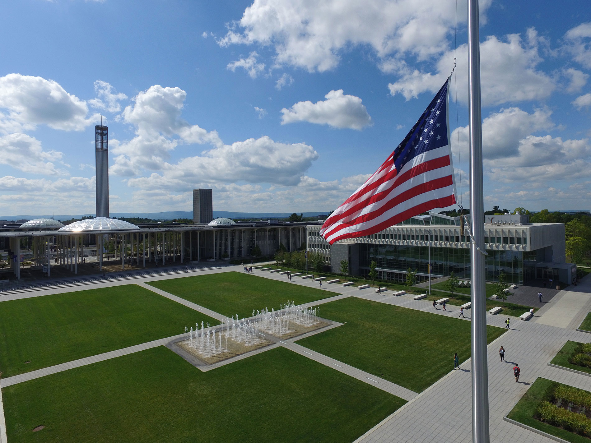 American flag flying over Collins Circle.