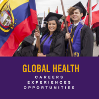 Two graduates stand outside in graduation gowns, holding brightly colored flags from their home countries.