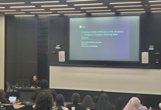 Maria De Sousa addressing a class of students in a lecture hall