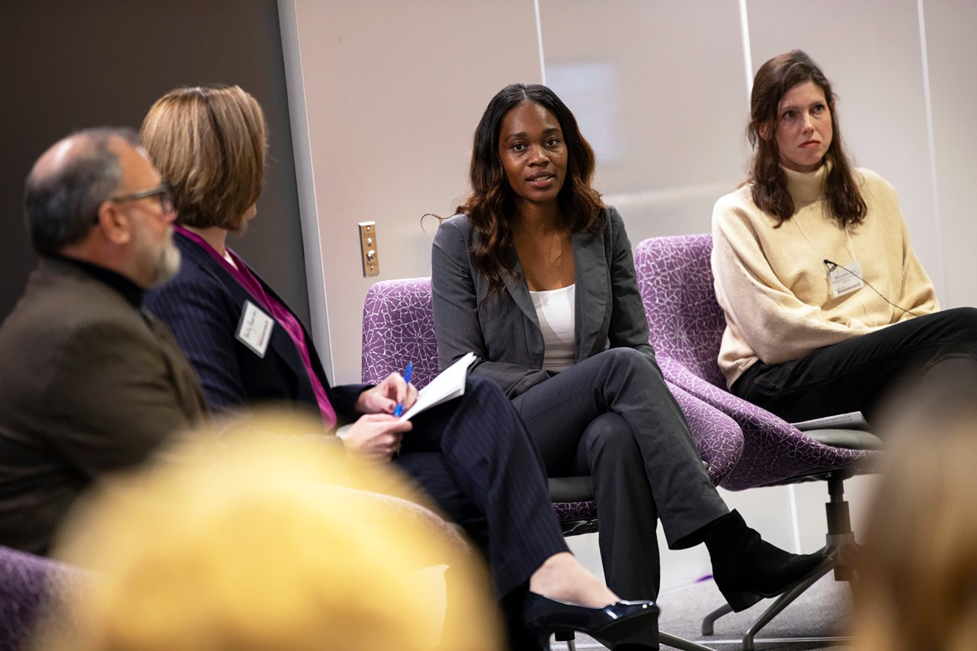 A woman takes part in a panel discussion on BioInnovation during Research and Entrpereneurship Week 2023 at UAlbany.