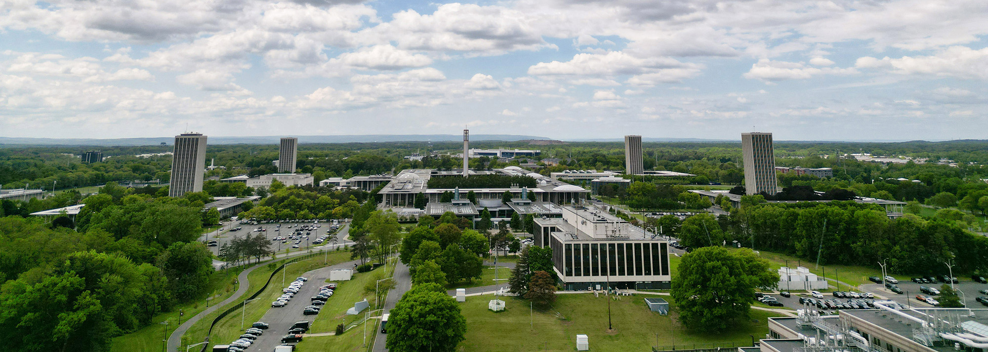 UAlbany's Uptown Campus, as photographed by a drone on a partly cloudy spring day.