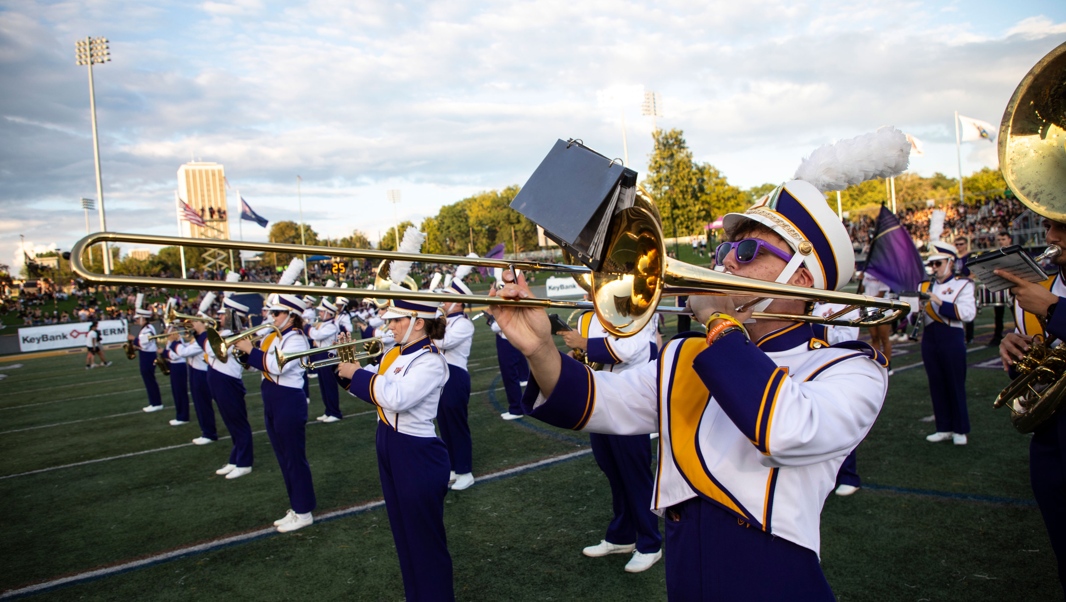 The Marching Great Danes perform in uniform on the Casey Stadium field.