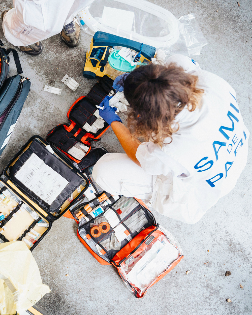 A paramedic with emergency kit.