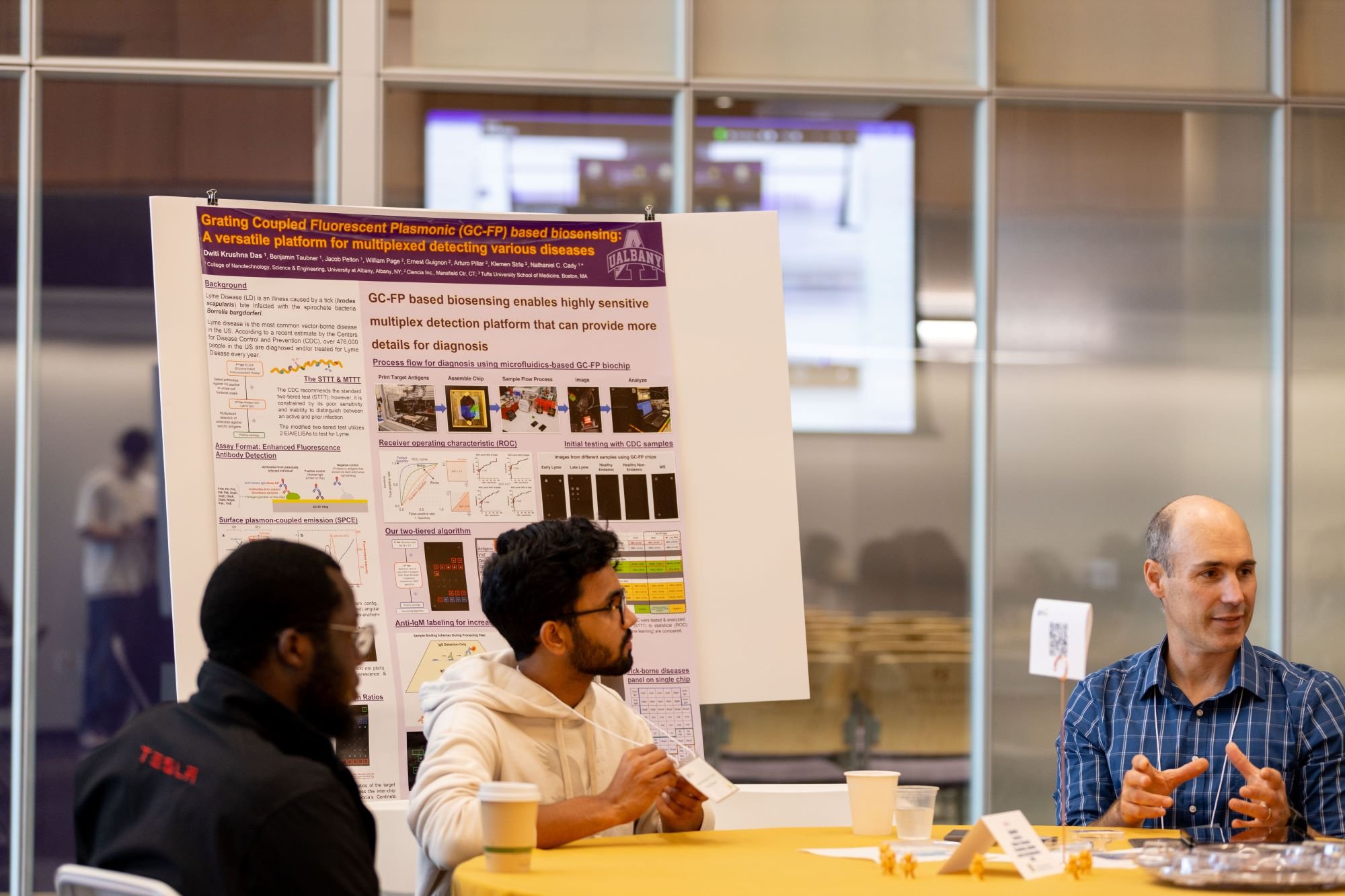 Students discuss their projects during R&E Week at UAlbany in October, 2024.