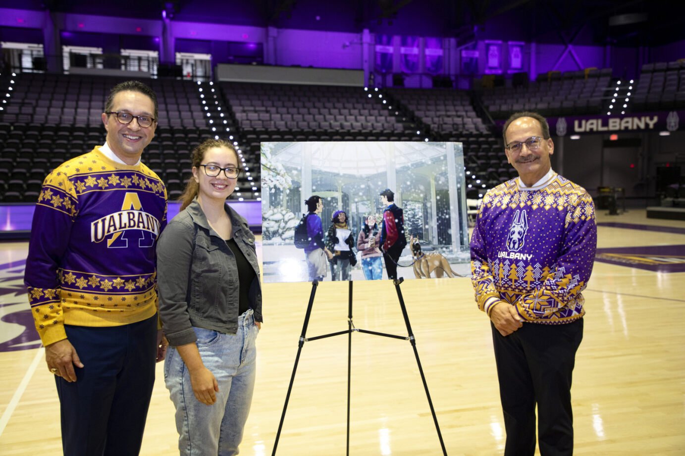 The President standing with the student winner of the Winter Greeting Card Contest.