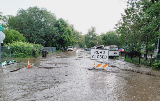 A road closed sign is seen in an area flooded from Hurricane Helene.