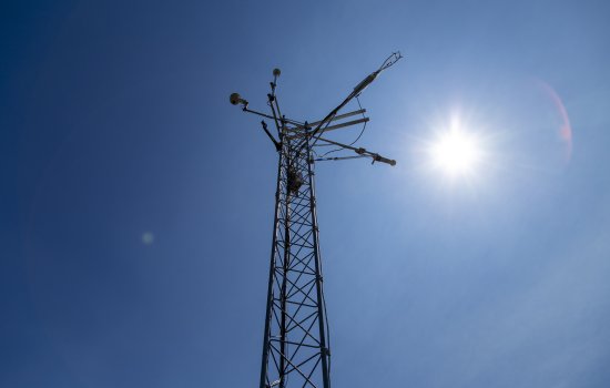 The sun shines over the New York State Mesonet station at Indian Ladder Farms in Voorheesville.