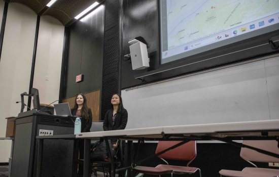 Pamela Hoxha (left) and Jaelyn Staiano (right) present about the Complex Case Mapping and Analysis Project
