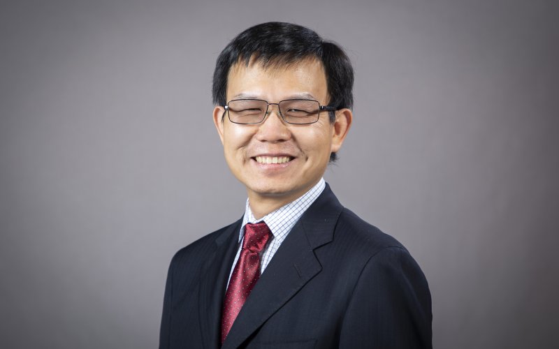 A portrait of Kai Zhang.