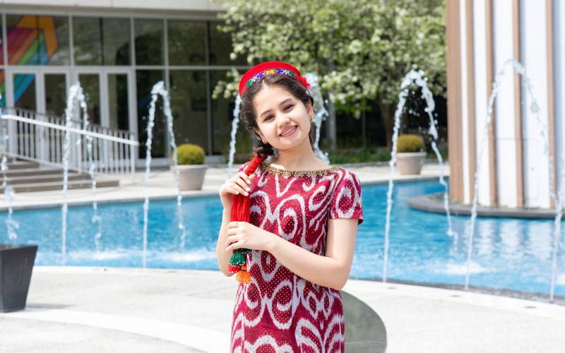 Graduate student Aziza Alimardonova poses in her Tajikistan dress.