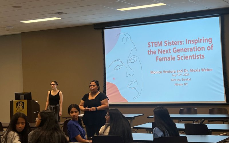 UAlbany alumni Mónica Ventura, PhD '24,  and Dr. Alexis Weber, PhD '24, present a presentation titled "STEM Sisters: Inspiring the Next Generation of Female Scientists."