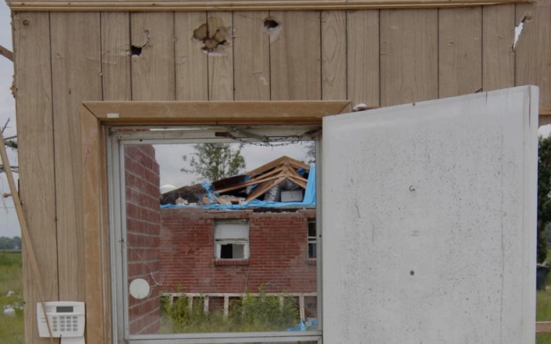 Broken down home showing environmental damage