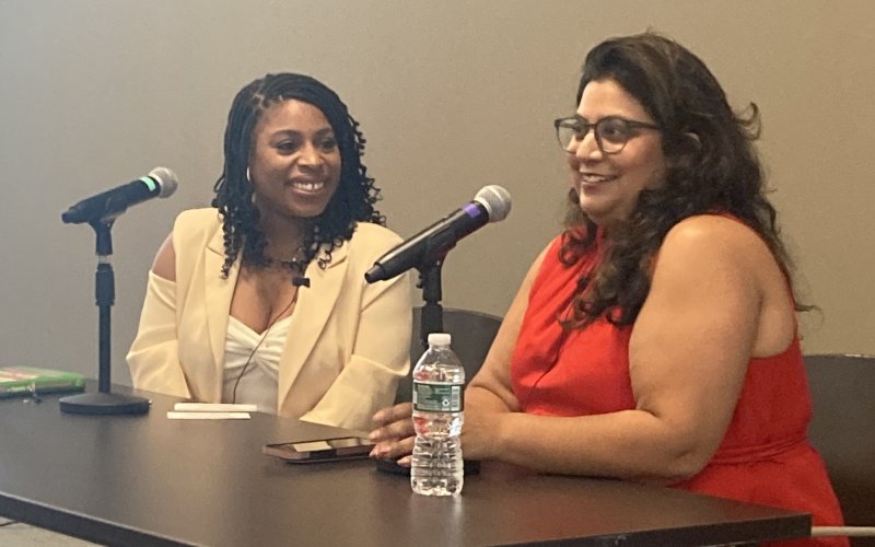 Deshanna Wiggins, the Albany Black Chamber of Commerce & Social Club CEO shown in conversation with author Samhita Mukhopadhyay