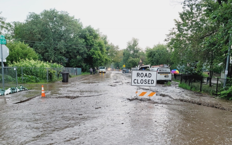 A road closed sign is seen in an area flooded from Hurricane Helene.