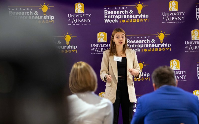 A student participates in the quick pitch competition during the 2023 R&E Week activities at UAlbany.