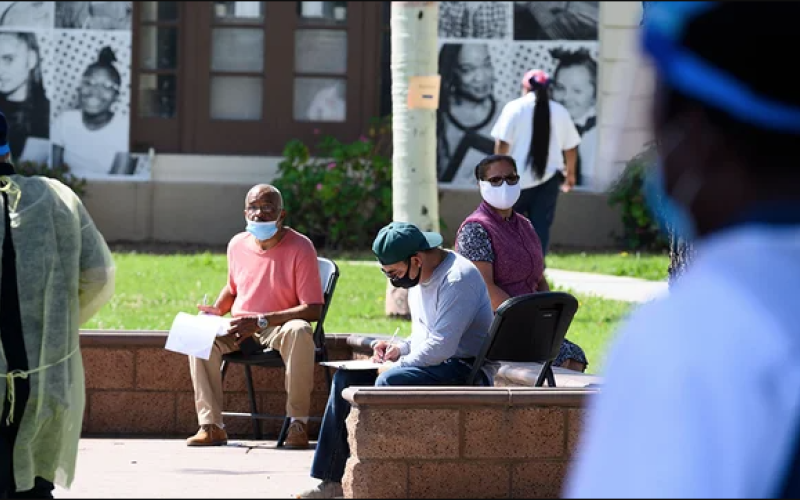 Individuals wearing masks in public