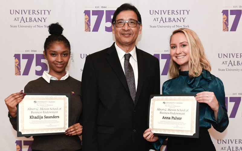 School of Business Students Khadija Saunders and Anna Pulver Receive Awards From Dean Nilanjan Sen