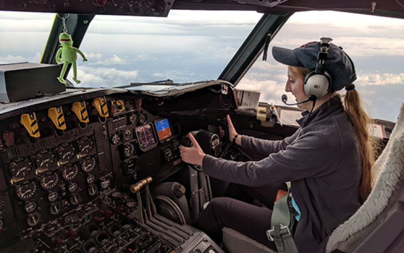 DAES student Emily Paltz flies Kermit – the NOAA42 P-3 Hurricane Hunter – during the OTREC field campaign. (Photo by Brian Richards)