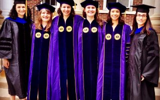 Last year's Department of Atmospheric and Environmental Sciences female PhD graduating class with professors Kristen Corbosiero (left) and Andrea Lang (right).