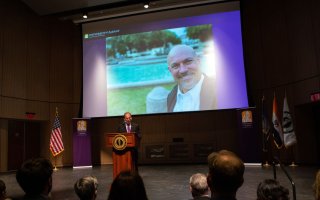 President Rodríguez announces the launch of the Institute for Social and Health Equity at the Spring Address in the Campus Center auditorium.