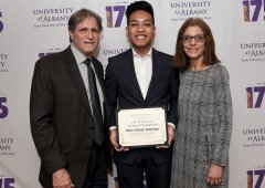 Marc Xavier Asuncion receives the Eric R. Solomon Memorial Scholarship from the Solomon Family