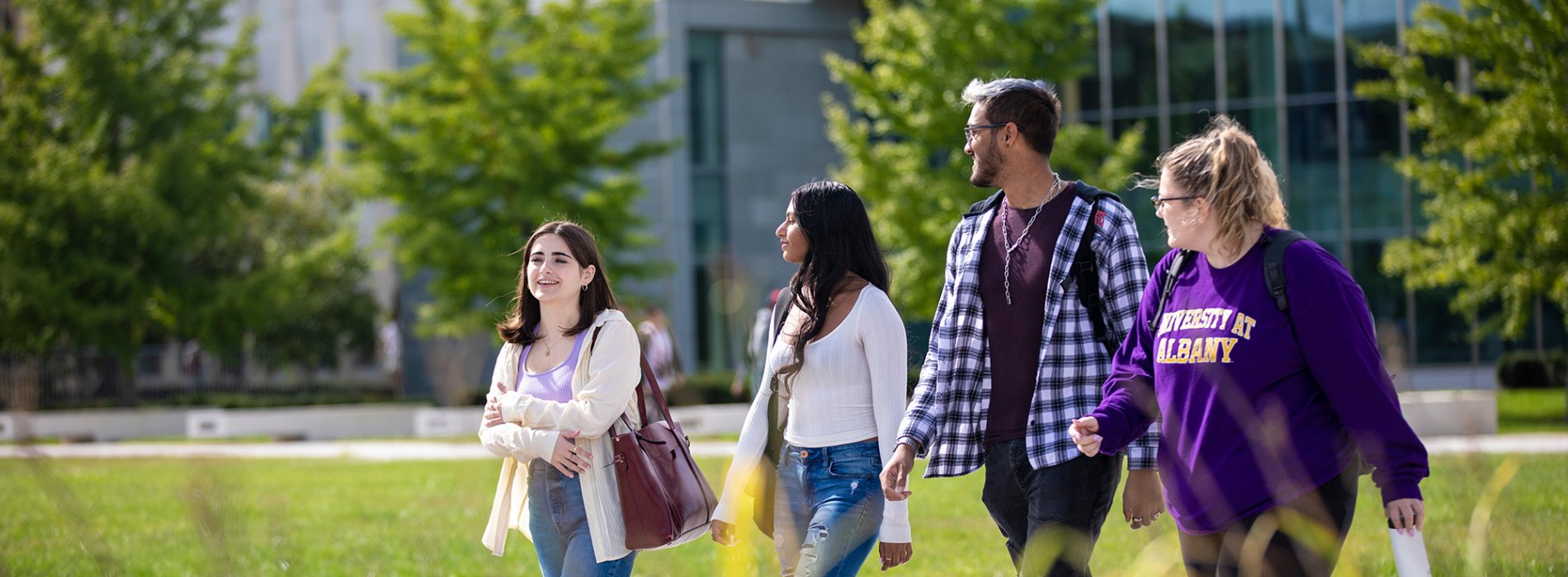 Students walking together on campus.