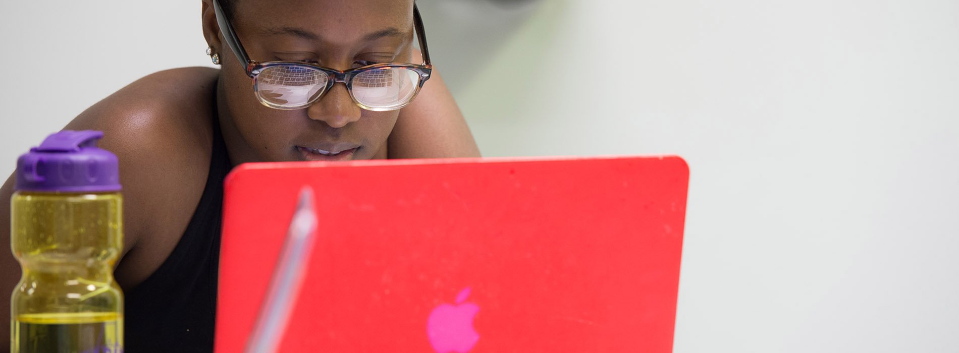 online student working on computer