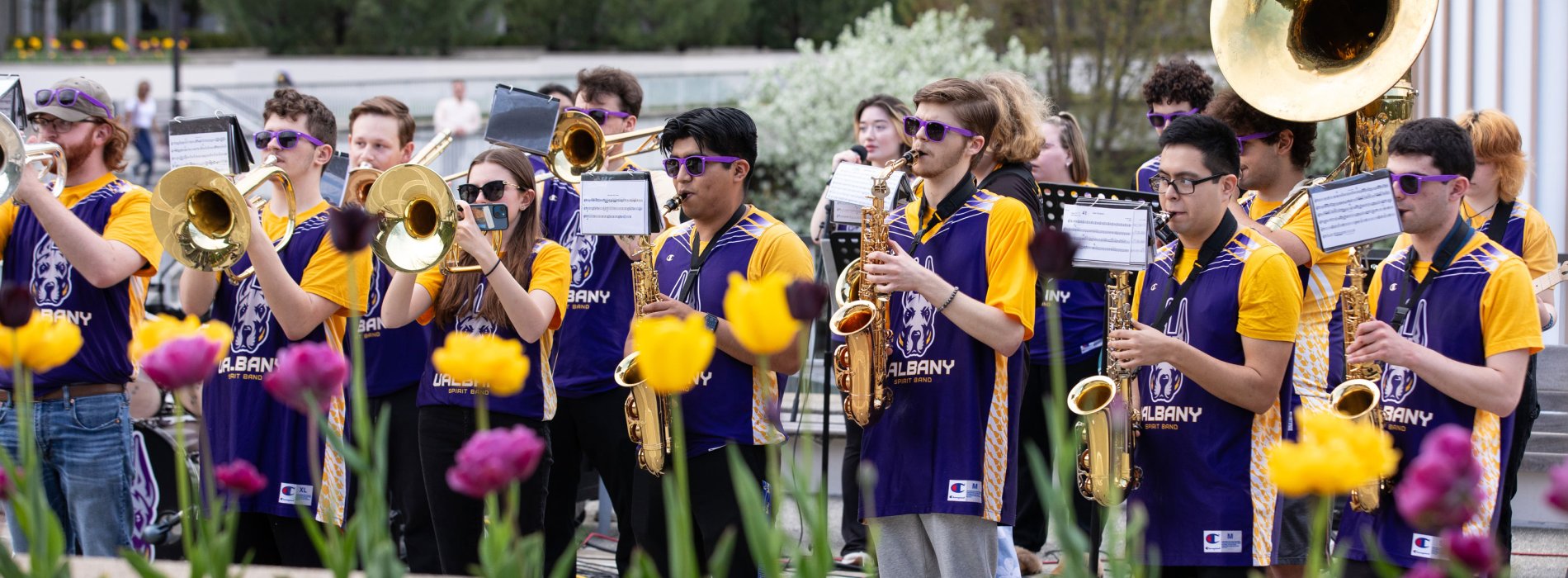 The UAlbany Spirit Band performs outdoors on the Uptown Campus.