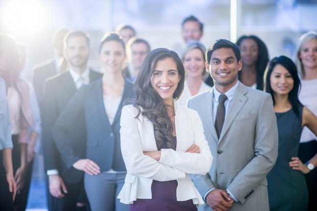 A group of smiling young professionals.